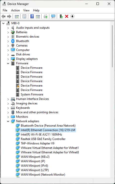 Windows Device Manager context menu on the network adapter showing the Update driver option
